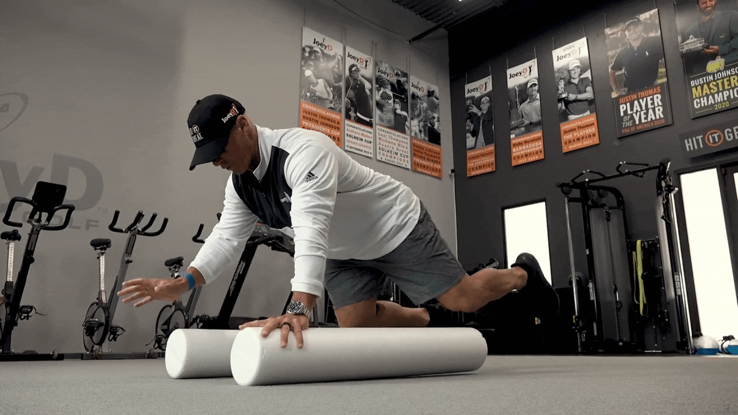 Coach Joey D performing a foam roller drill (described above)
