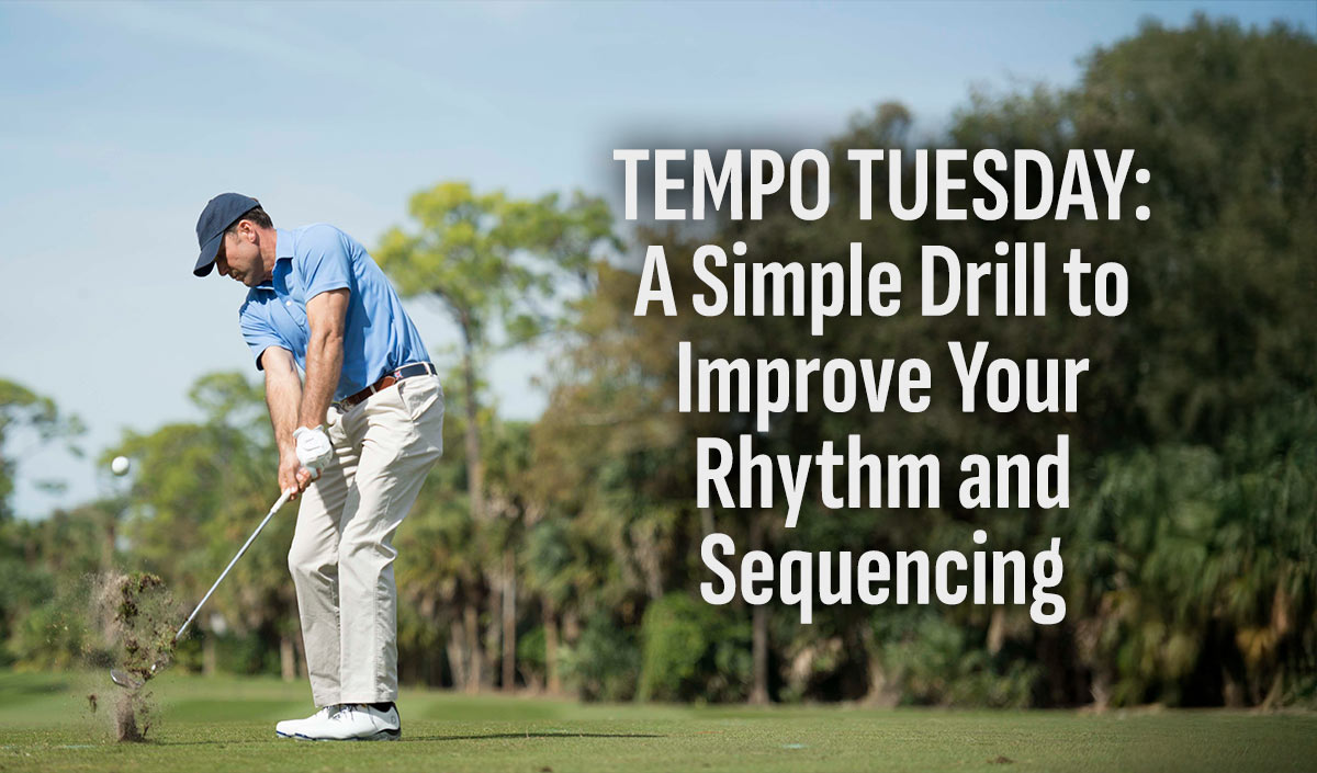 man swinging golf club